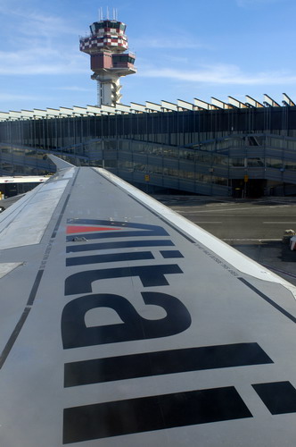 Fiumicino Airport Transfers picture of an Alitalia plane wing.