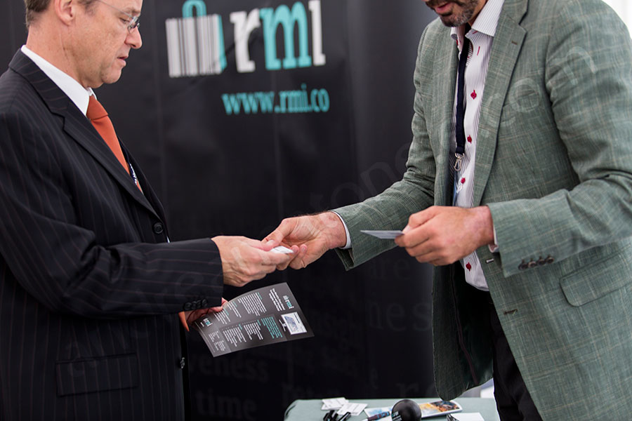 Business card exchange during a conference in Rome Italy