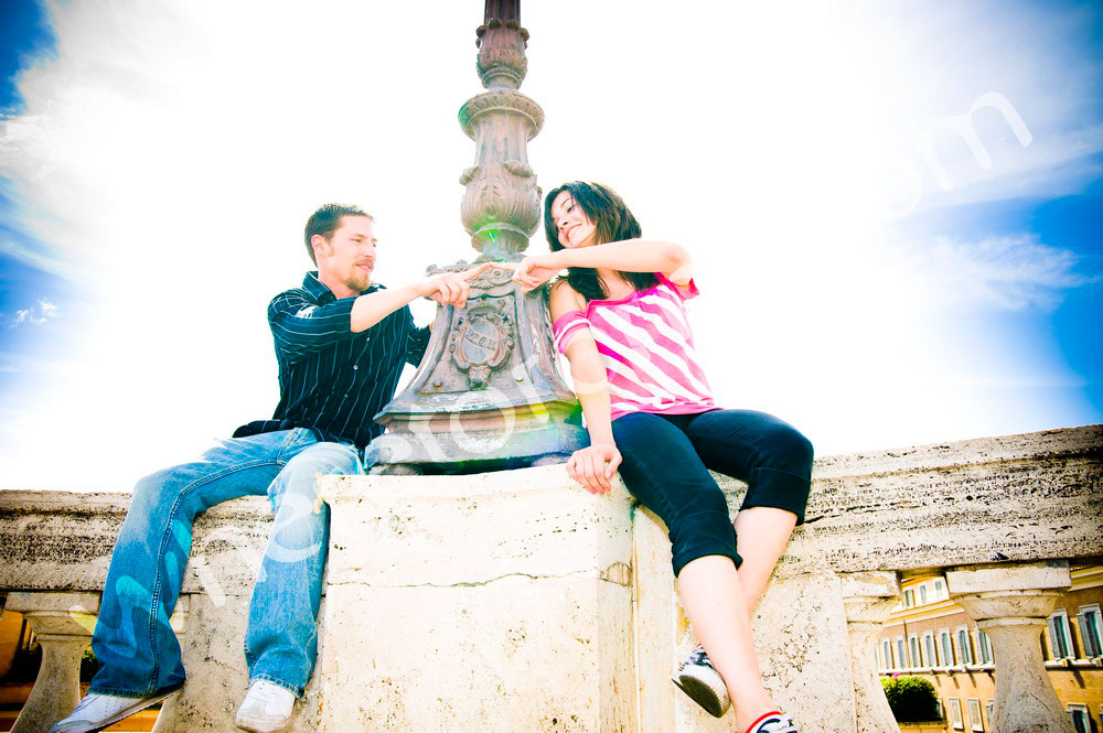 Couple touching fingers during a photo tour in Rome