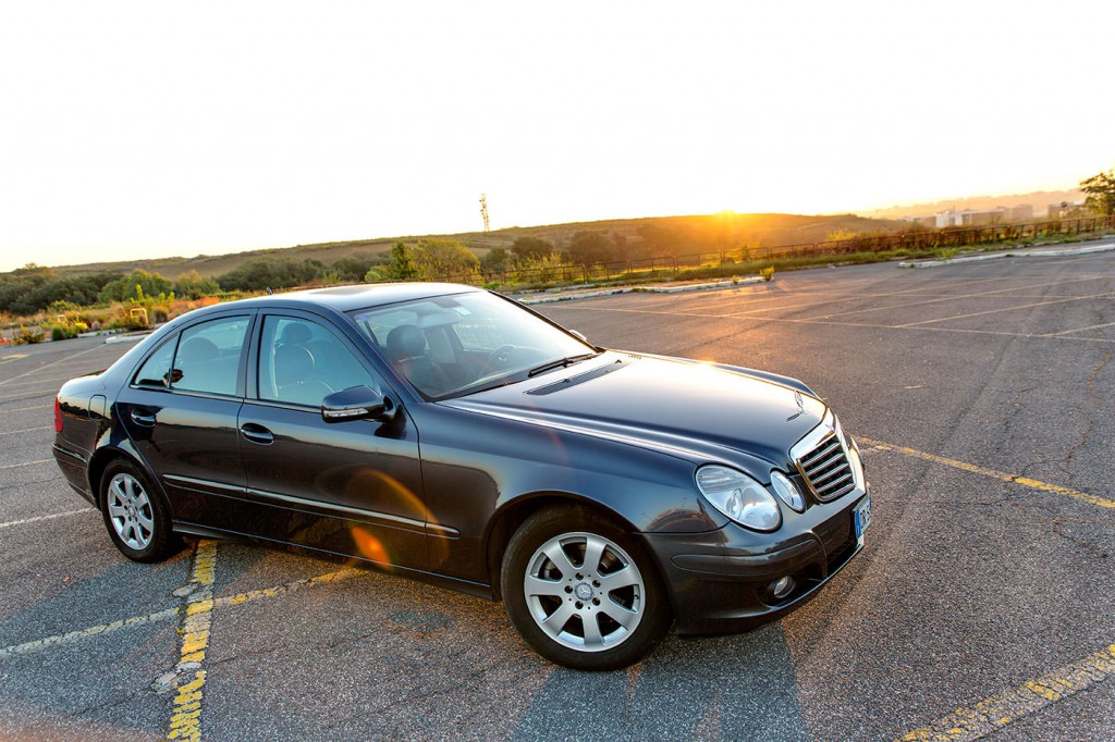 Mercedes E Class sedan at sunset