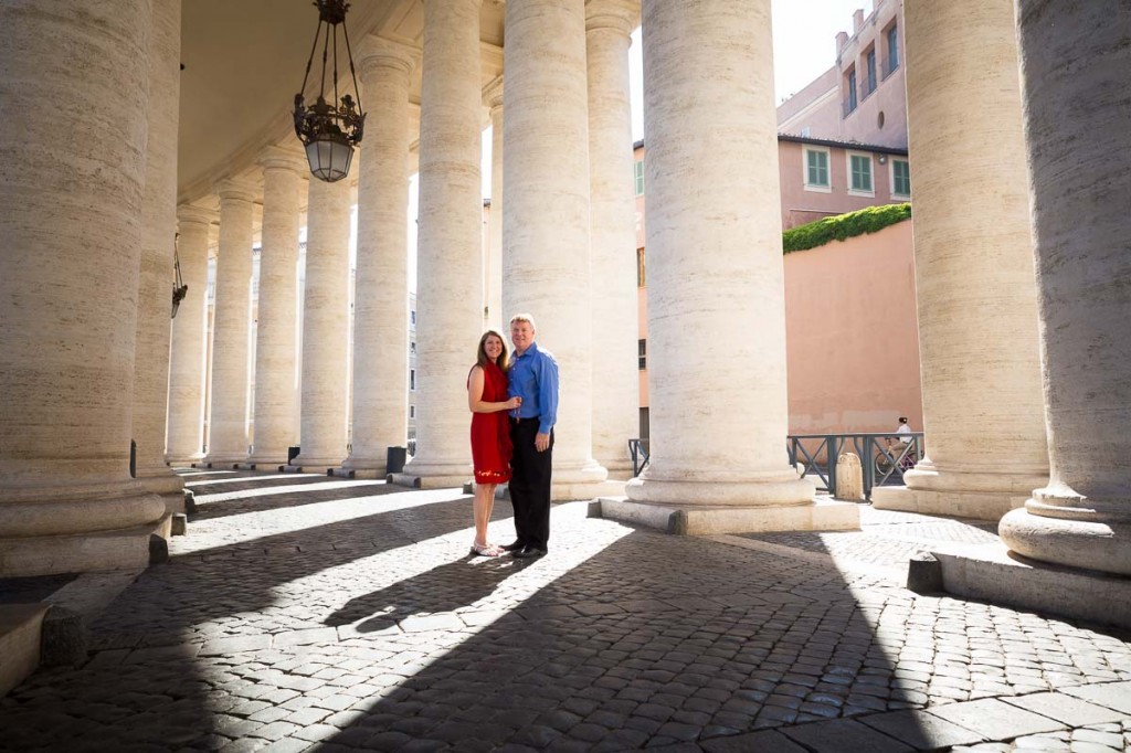 Underneath the columns contained in Saint Peter's square in the Vatican