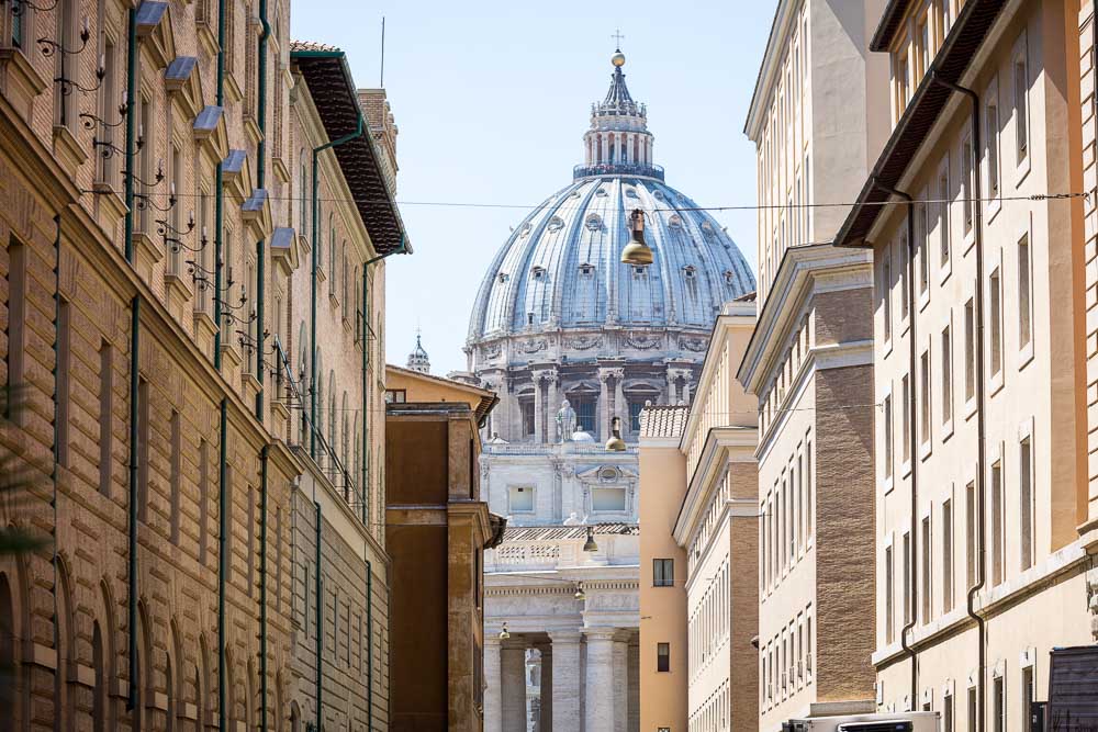 View over Saint Peter's Basilica in Rome taken from a side street