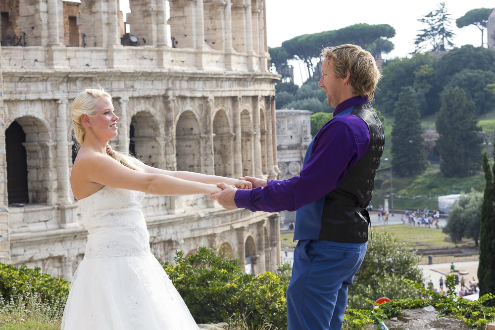 Posing by the Roman Colosseum