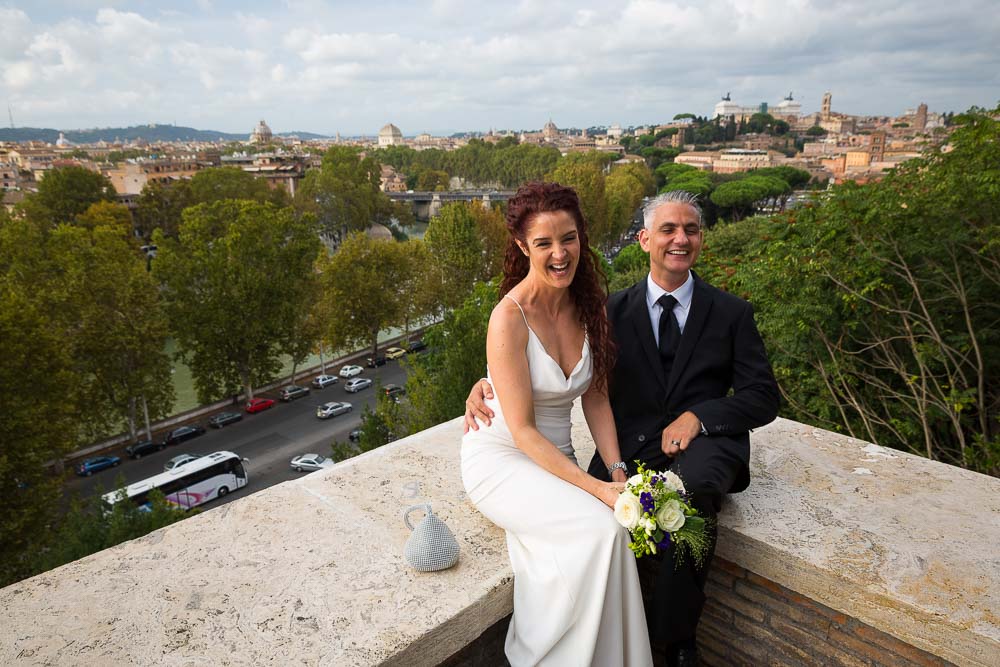 Taking pictures in front of the beautiful roman skyline.