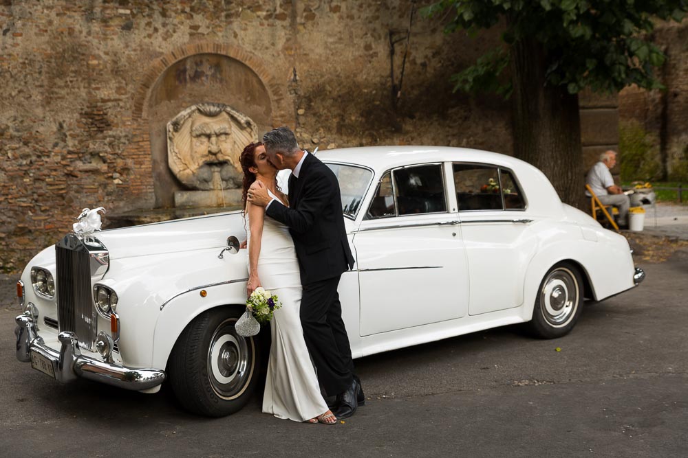 Kissing by the Rolls Royce Silver Cloud .