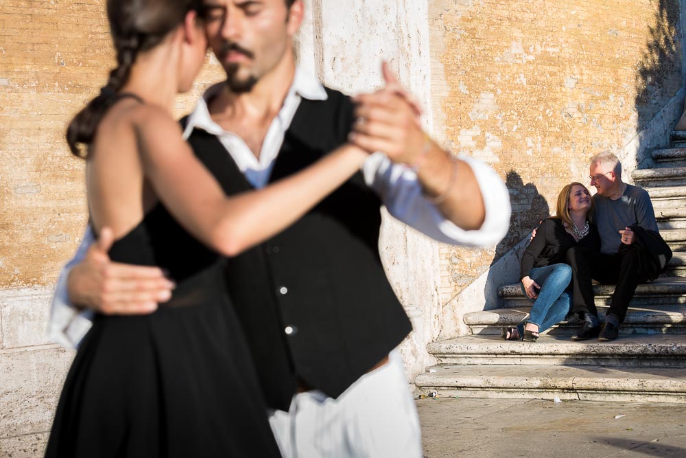 Portrait picture behind tango street artists.