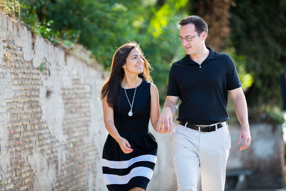 Walking together hand in hand during a photo shoot in Rome