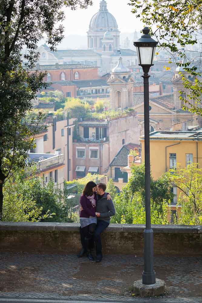 Couple together in love in Rome. Parco del Pincio. Villa Borghese.