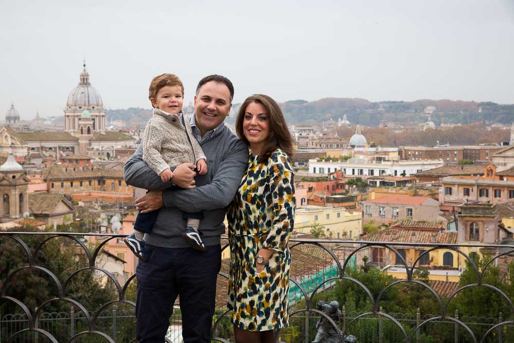 Family group photo with Rome as background