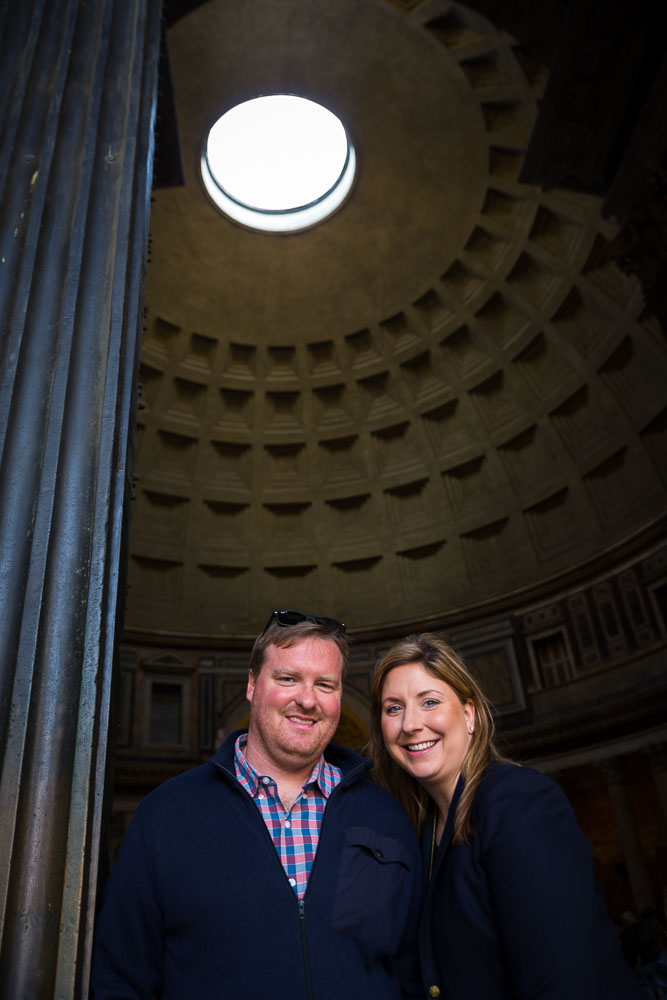 Portrait image taken underneath the hole above the ceiling of the Roman Pantheon in Rome Italy