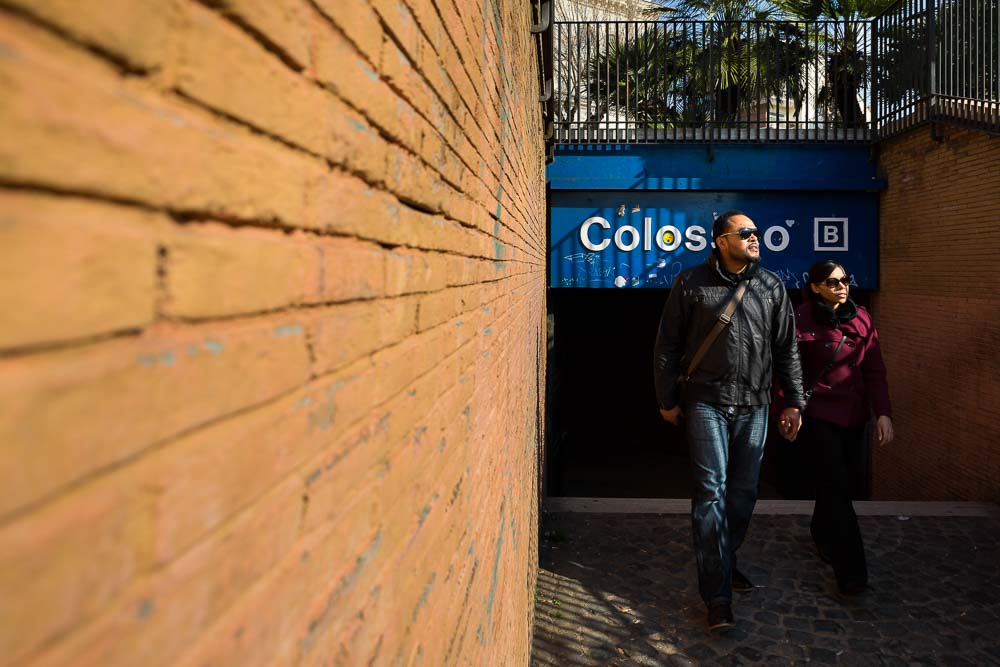 Couple exiting the colosseo metro stop 