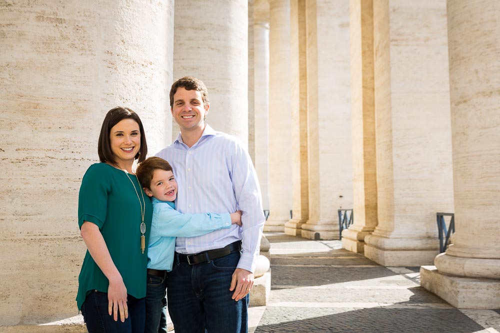 Standing close together under columns