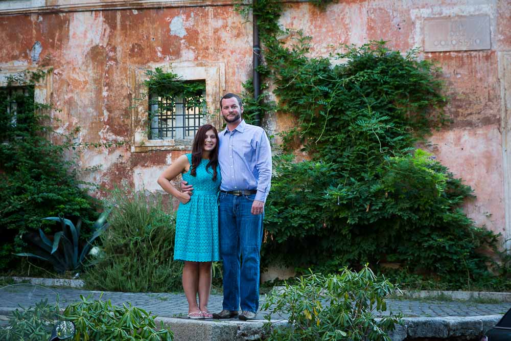 Standing posing in a characteristic roman alley way