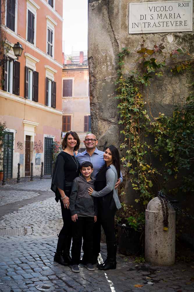 Classic family portrait picture taken in the trastevere quarter in Rome
