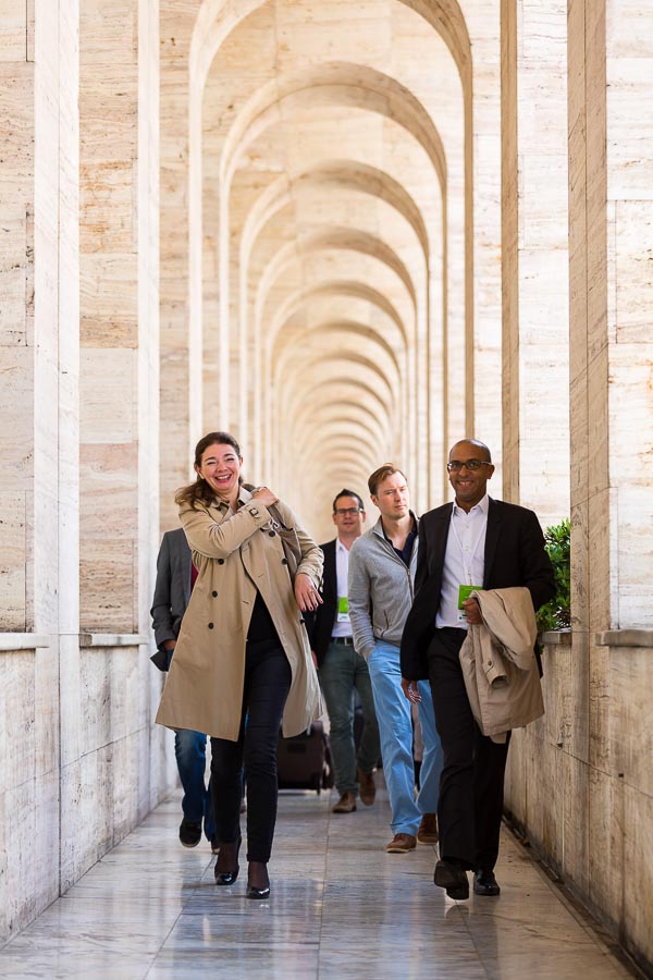 Convention attendees walking in a venue