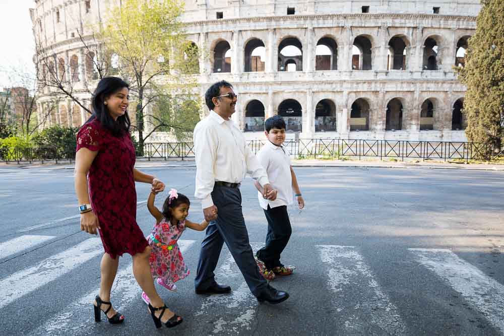 Walking across a road in front of the Coliseum